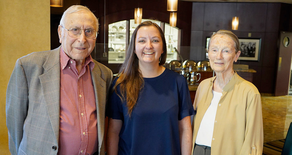 Dr. Nogee, Ms. Wright and Mrs. Nogee standing together at a restaurant